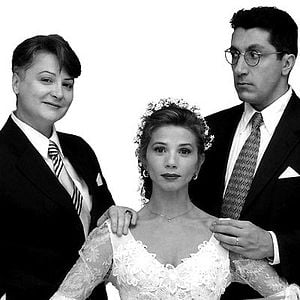 Foto Uma Cama Para Três