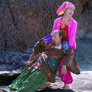 Foto Uma Mulher, uma Arma e uma Loja de Macarrão