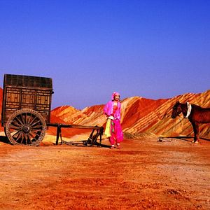 Foto Uma Mulher, uma Arma e uma Loja de Macarrão