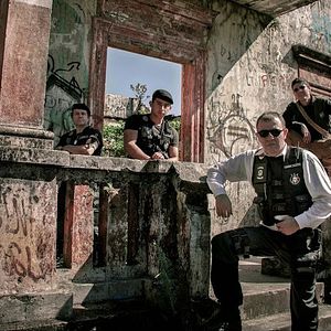 Foto Caçadores de Espécies e o Símbolo Secreto