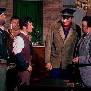 Foto O Mundo em Seus Braços