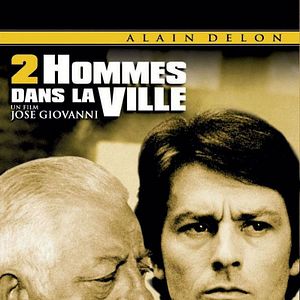 Foto Dois Homens Contra uma Cidade