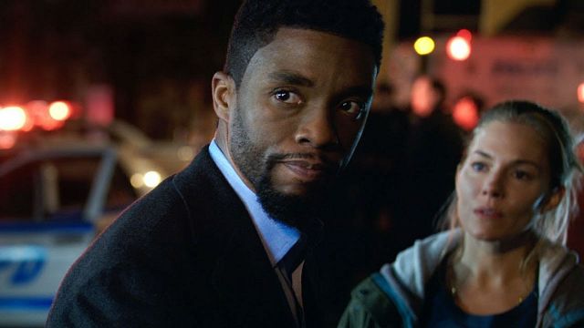 Imagem da notícia San Diego Comic-Con 2019: Chadwick Boseman caça bandidos em novo trailer de Crime sem Saída