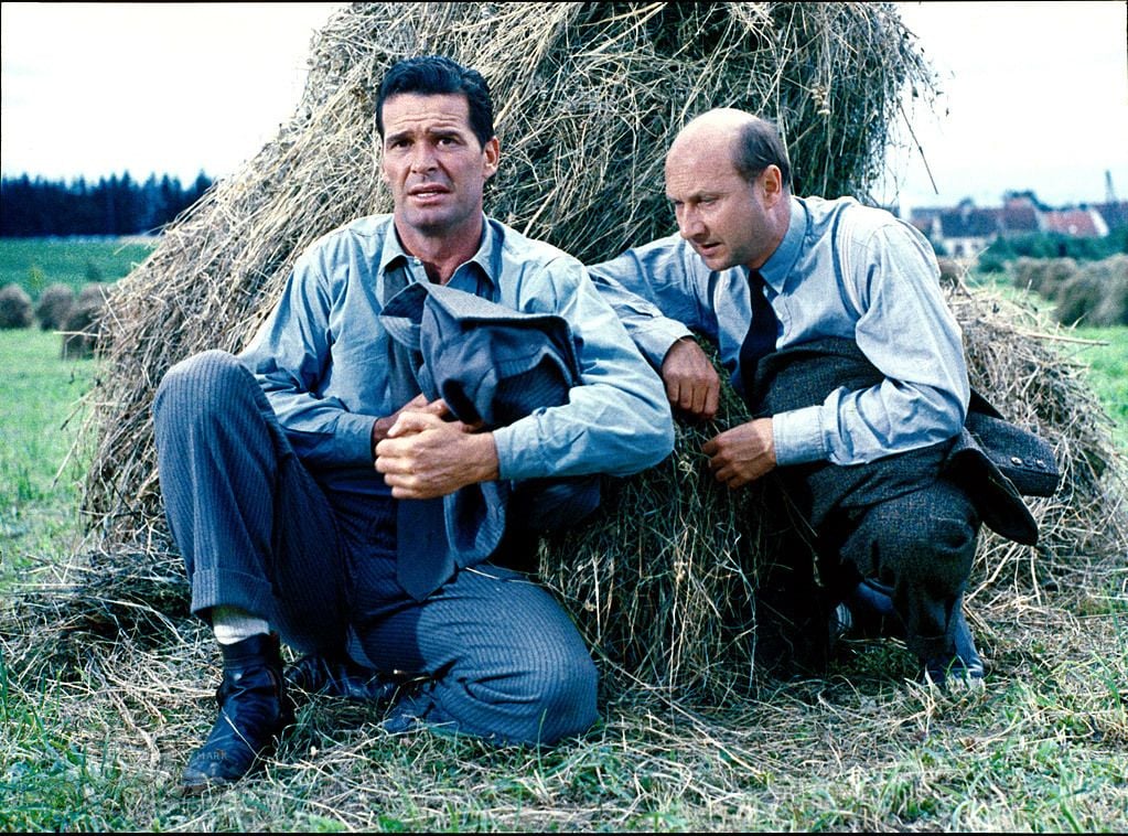 James Garner (esq.) em Fugindo do Inferno.