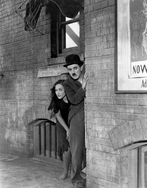 Tempos Modernos : Fotos Paulette Goddard, Charles Chaplin